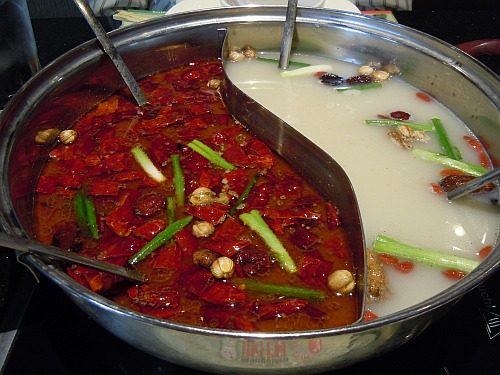 Mongolian Hot Pot with the mild and spicy broths served in a yin-yang bowl.