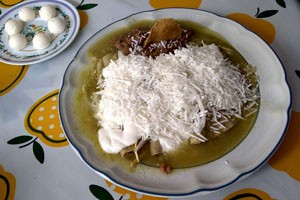 Green enchiladas with refried beans