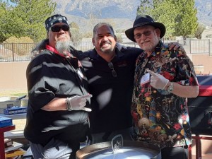 Fiber Joe, Nevin Montano, and CaJohn getting ready to treat the crowd to shrimp and veggies done up with CaJohn's Black Garlic Hot Sauce. 